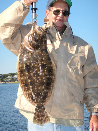 Bob-with-6.75-Pound-Flounder-Oct-5-2010.jpg